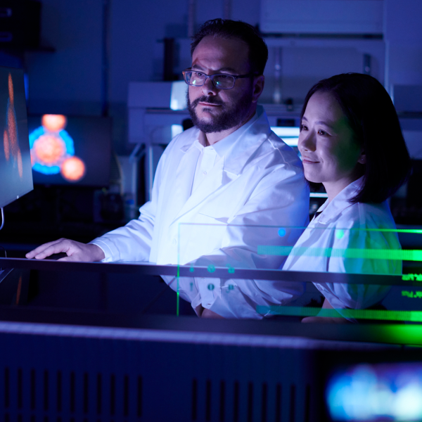 CU researchers working in a drug discovery lab