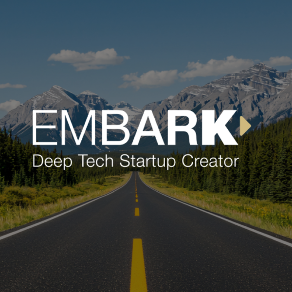Embark Deep Tech Startup Creator wordmark over a road leading into the mountains