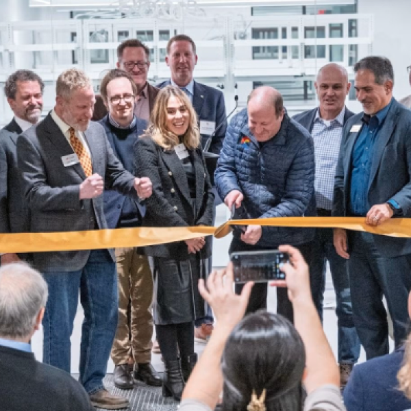 Colorado Gov. Jared Polis cuts the ribbon for the Quantum Incubator, a facility in Boulder that seeks to foster new quantum companies and technologies