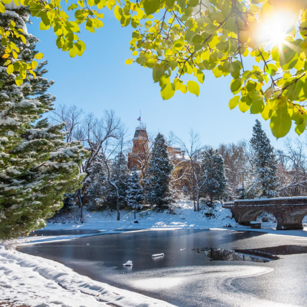 CU Boulder campus shot of sunny lake in winter
