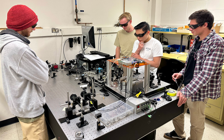 Quantum Forge students working in the lab