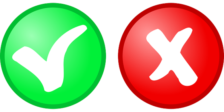 A round green button with a check mark next to a round red button with an X.