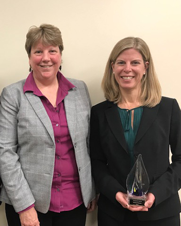 Karen Regan receives the RIO Champion Award