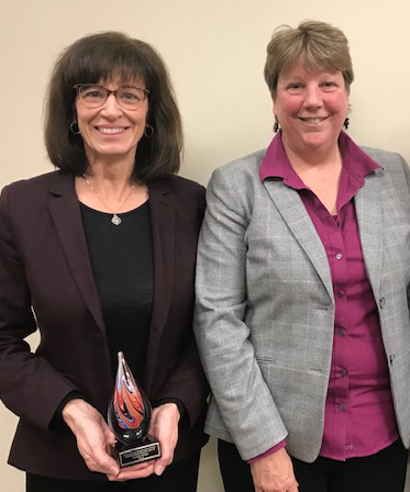 Linda Rose receives the RIO Outstanding Partner Award