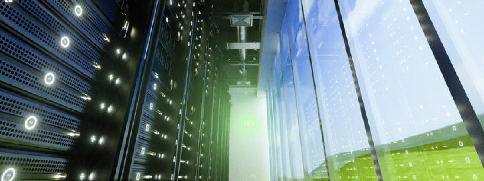 Image of data center with green landscape reflected on opposite side