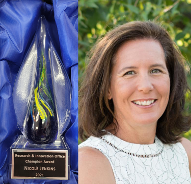 Nicole Jenkins with award