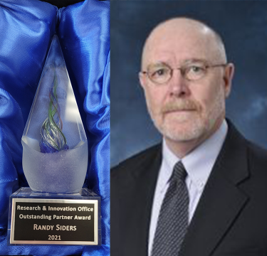 Randy Siders with award