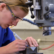 Researcher working in the JILA Machine Shop