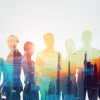 Silhouettes of workers overlaid with city image