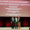 three award winners on stage
