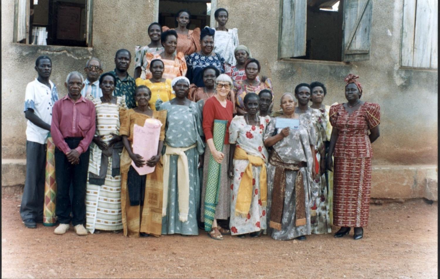 Group photo of individuals with Marjorie McIntosh