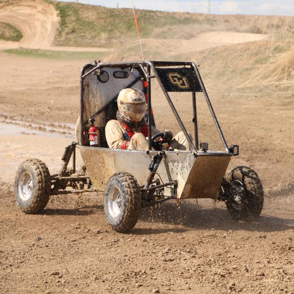 Jack driving out of the puddle