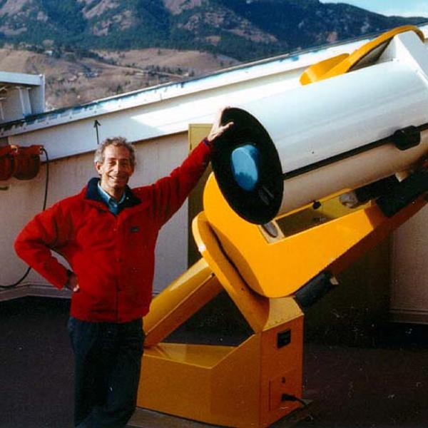 18-inch Scope with Director Bruce Bohannan (no, it's not supposed to point downward!) (1987) Photo credit Keith Gleason,  Sommers-Bausch Observatory
