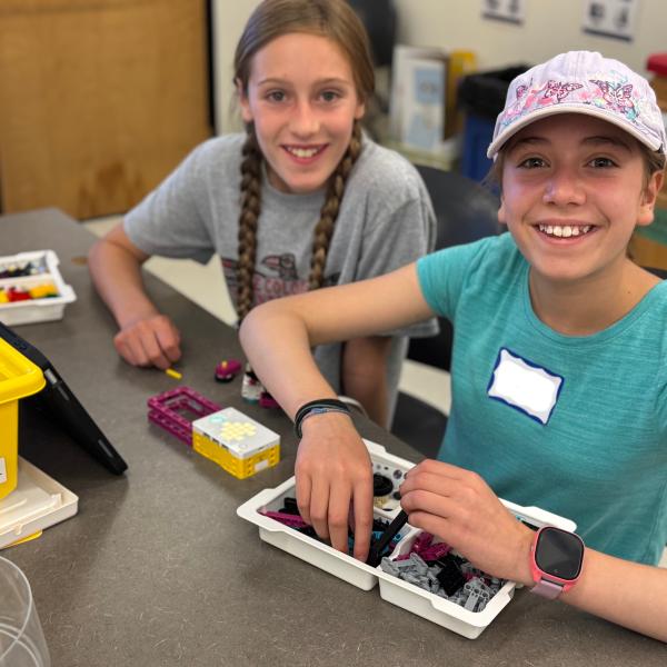2 students doing lego spike prime buiild