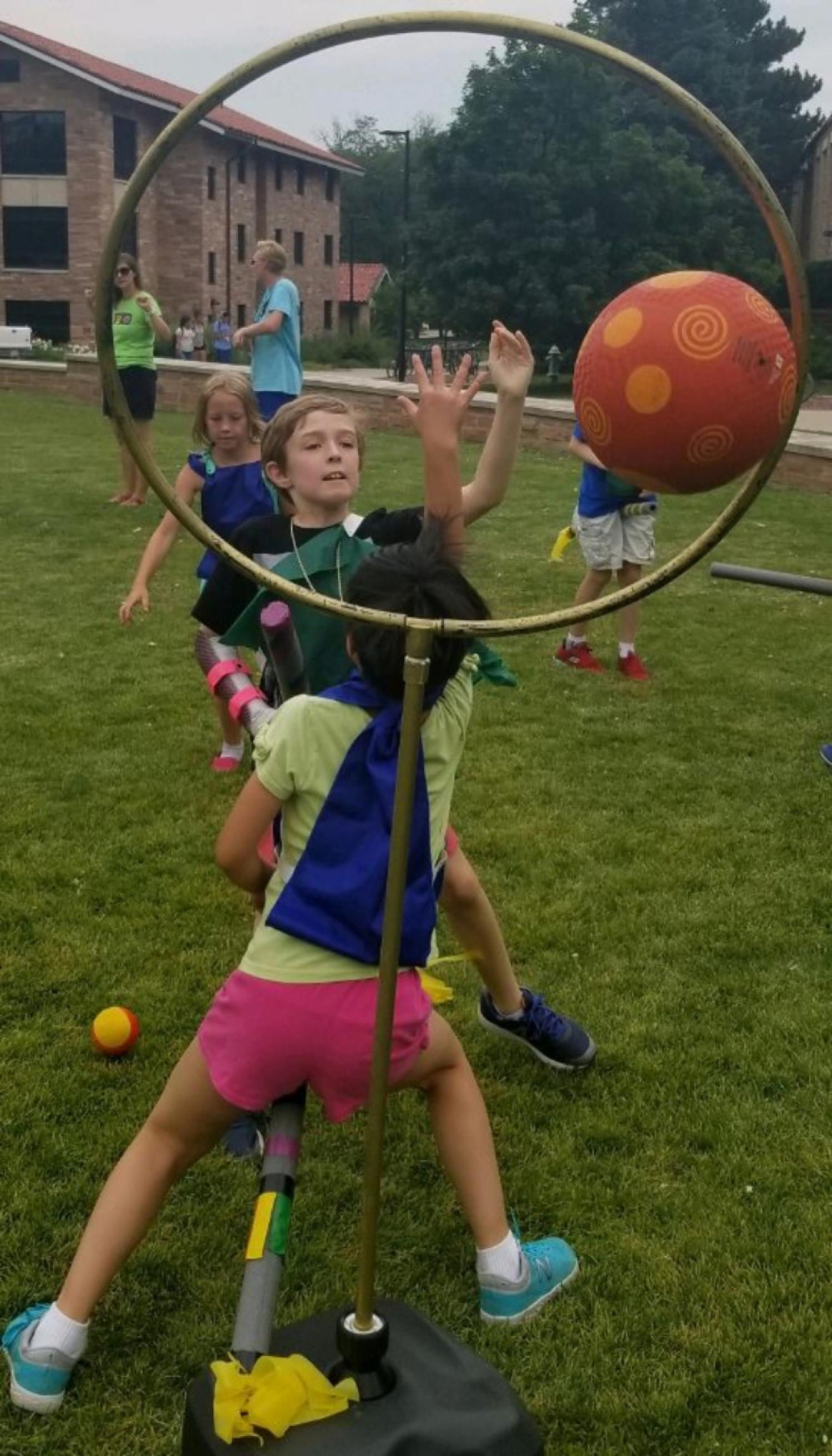 kids playing quidditch 