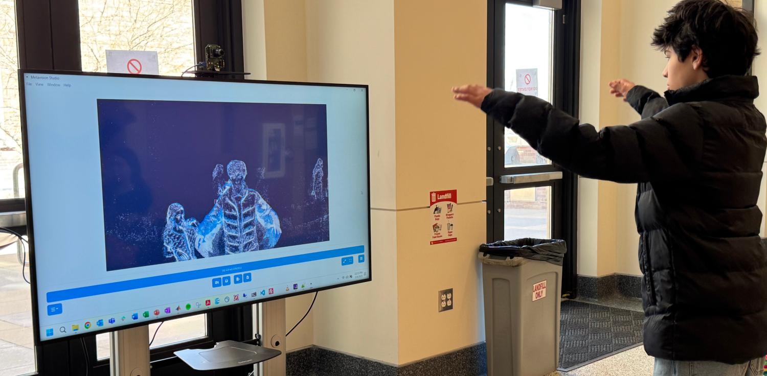 student testing thermal imaging at STEAMfest