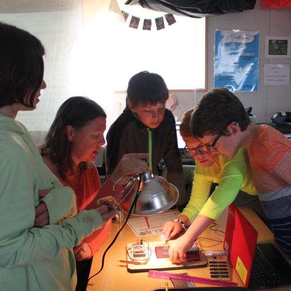 teacher doing activity with students