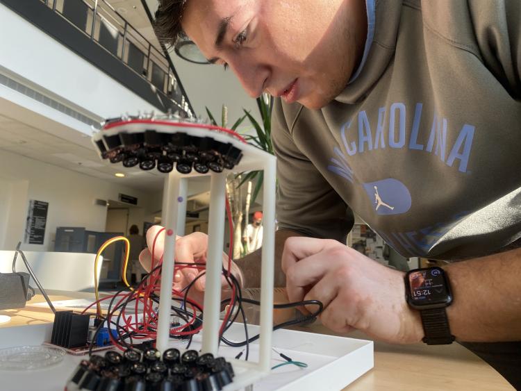 person looking at tabletop activity