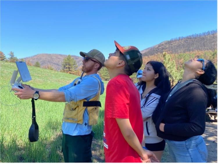 cal-wood students looking at sky