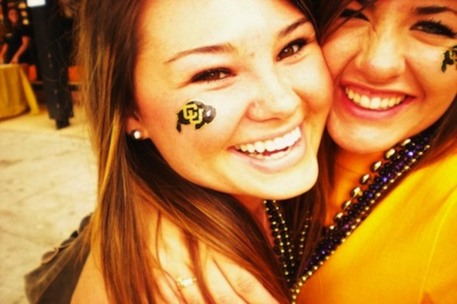 Girls with Ralphie Logo facepaint