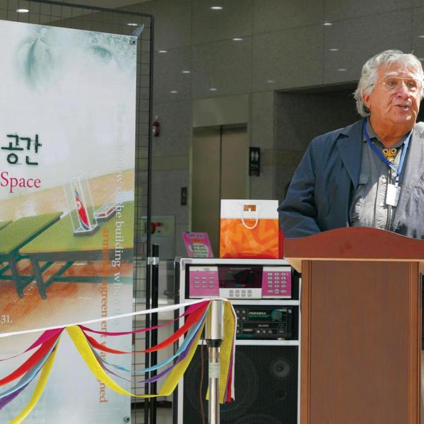 Professor at podium in South Korea
