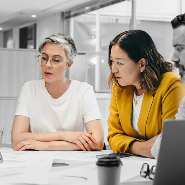 Group sitting at a table for a business meeting