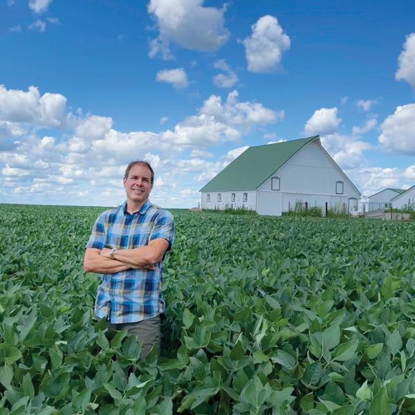 Brian DeDecker in a soybean field at his family farm in Illinois