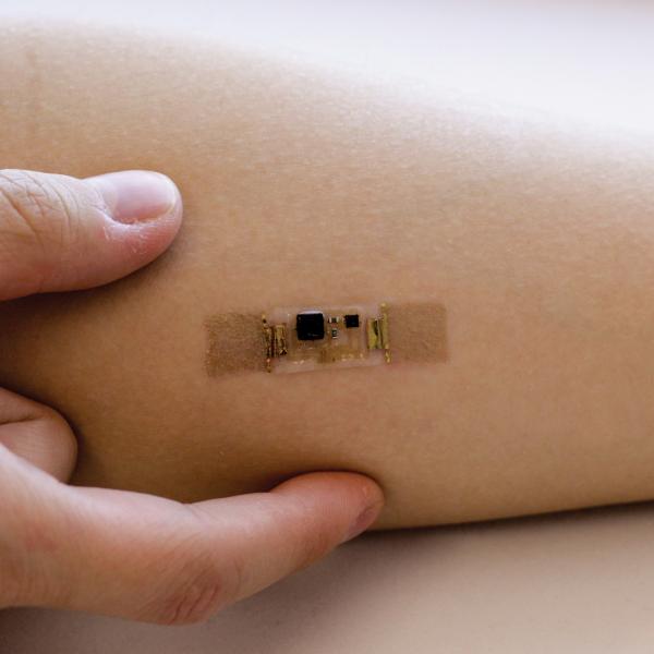 Tiny stethoscope on an arm