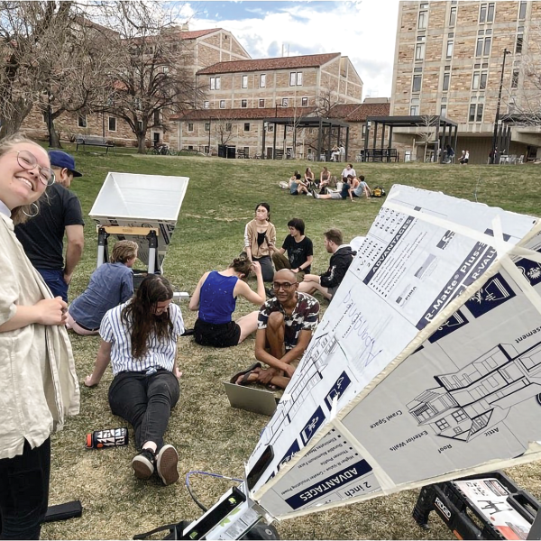 Students pointing their radio antennas to the sky outside Duane Physics