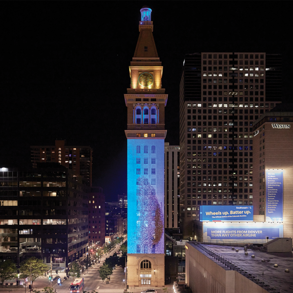 Molly Valentine Dierks' immMolly Valentine Dierks’ immersive video installation “The Tender Hand of the Unseen” shown on D&F Tower in Denver 