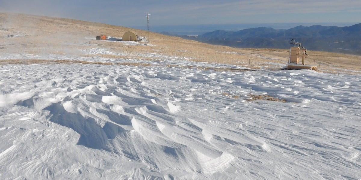 INSTAAR research on snow covered hillside