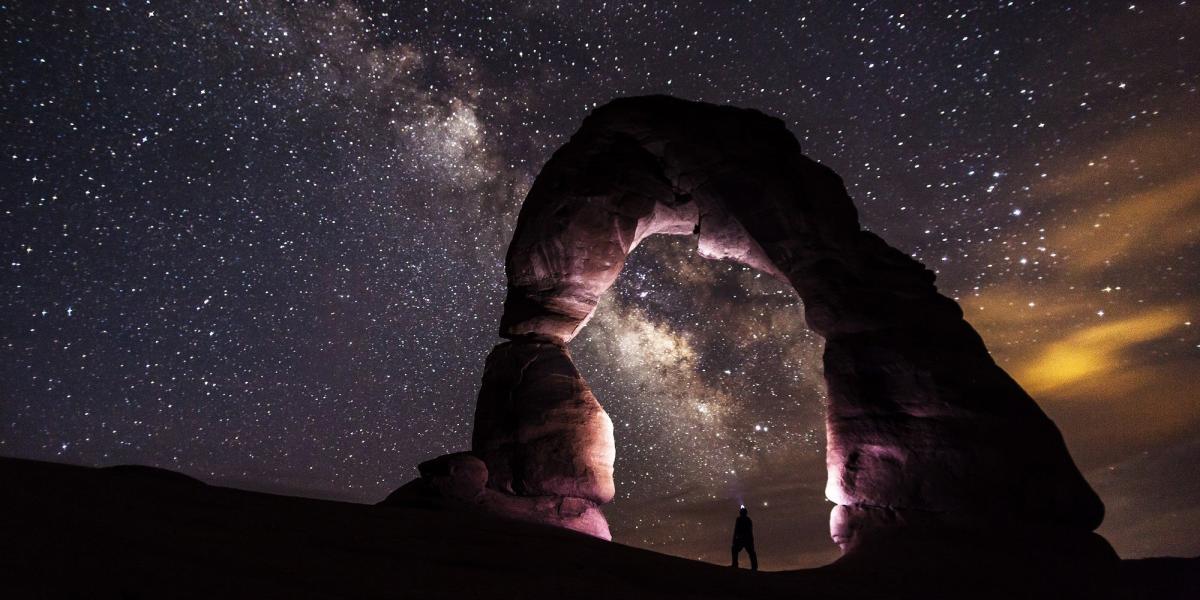 Milky Way behind arch in Arches National Park