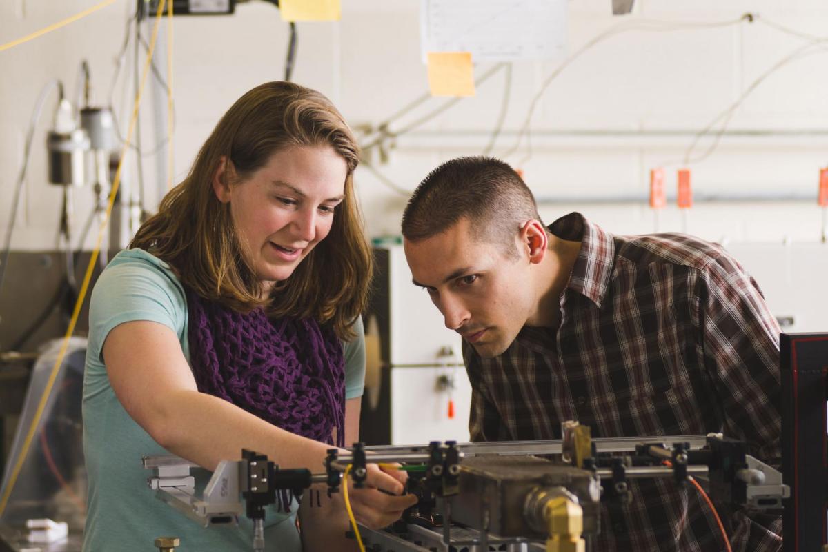 Professor and student in lab