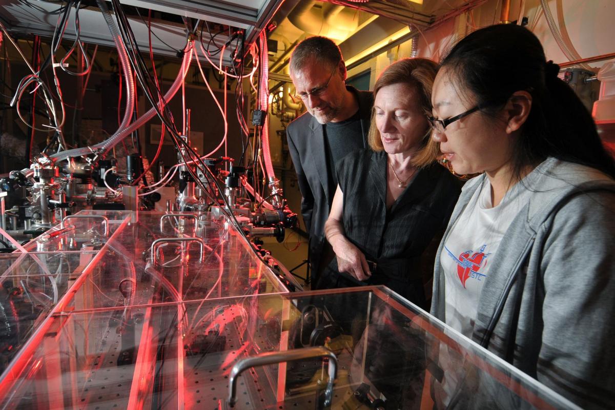 Professor and students in lab