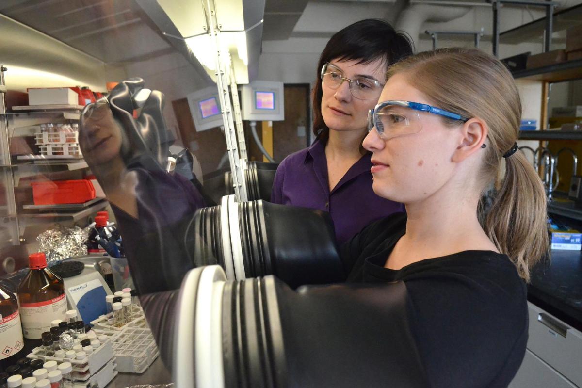 Professor with student in lab