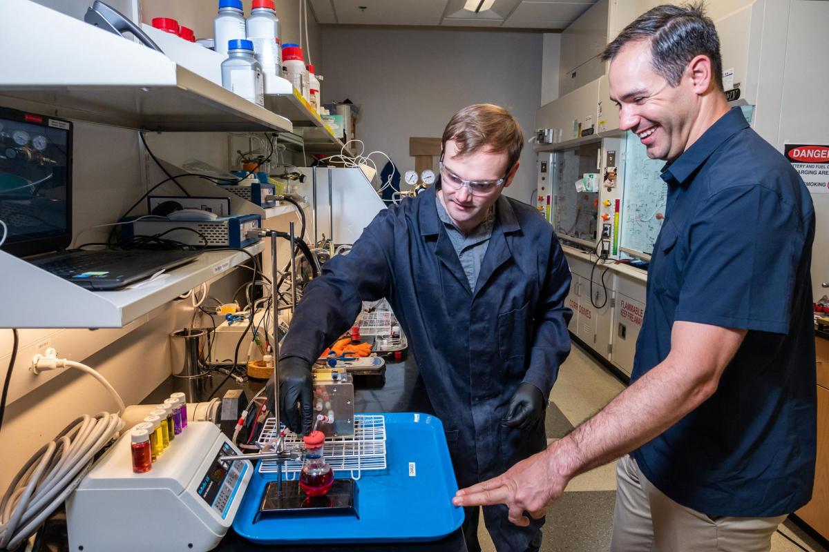Professor and student in chemistry lab