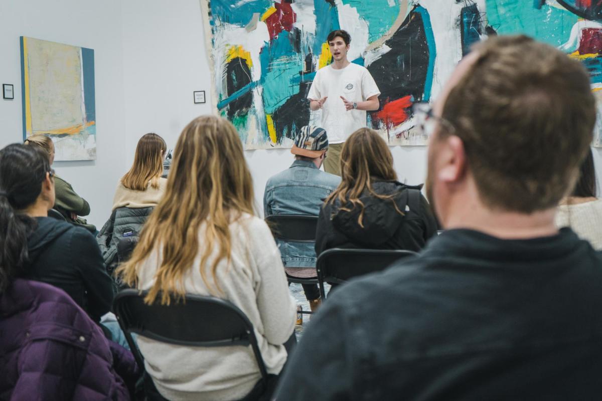 Students listening to art presentation in classroom