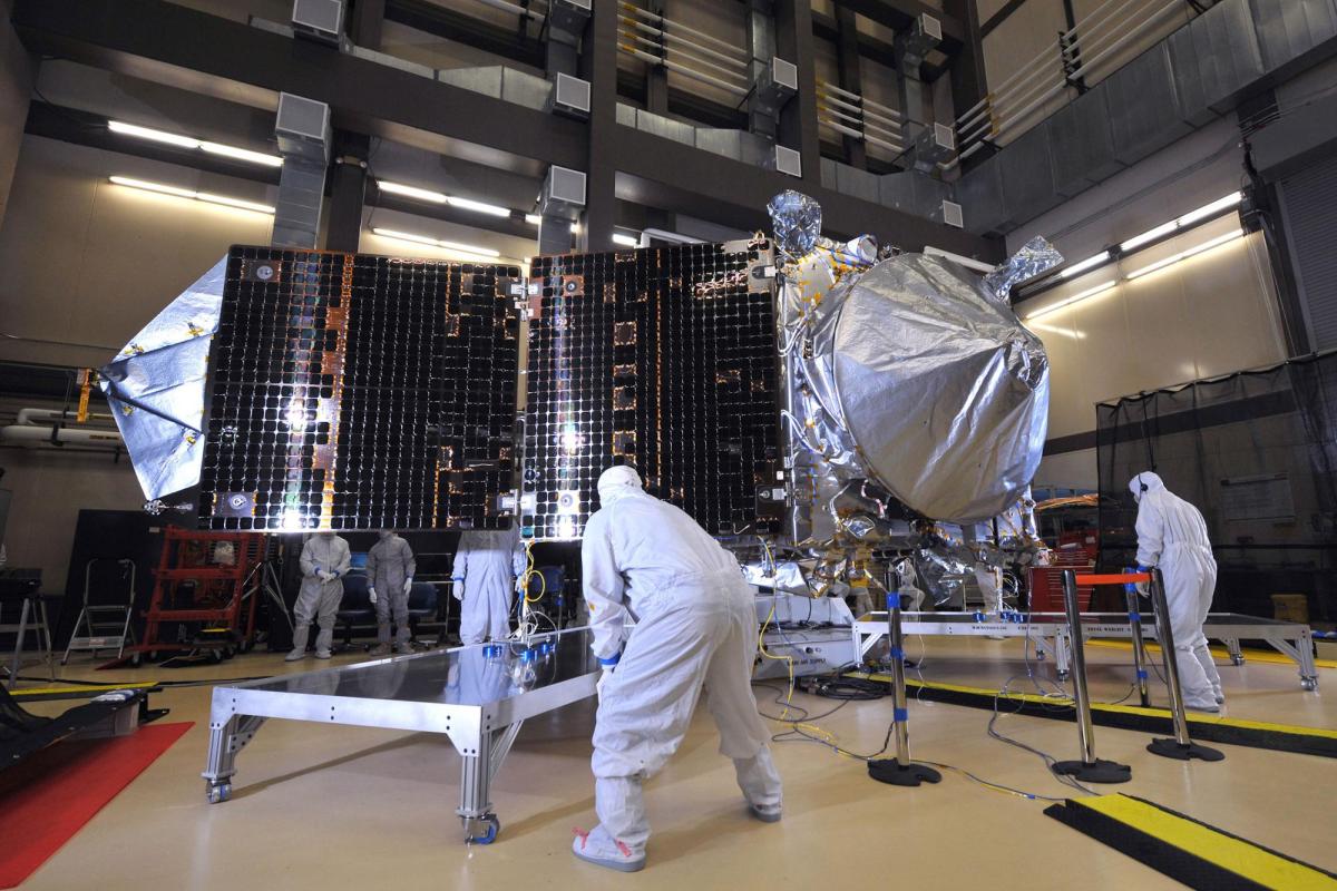 NASA's MAVEN spacecraft tests its solar arrays during environmental testing
