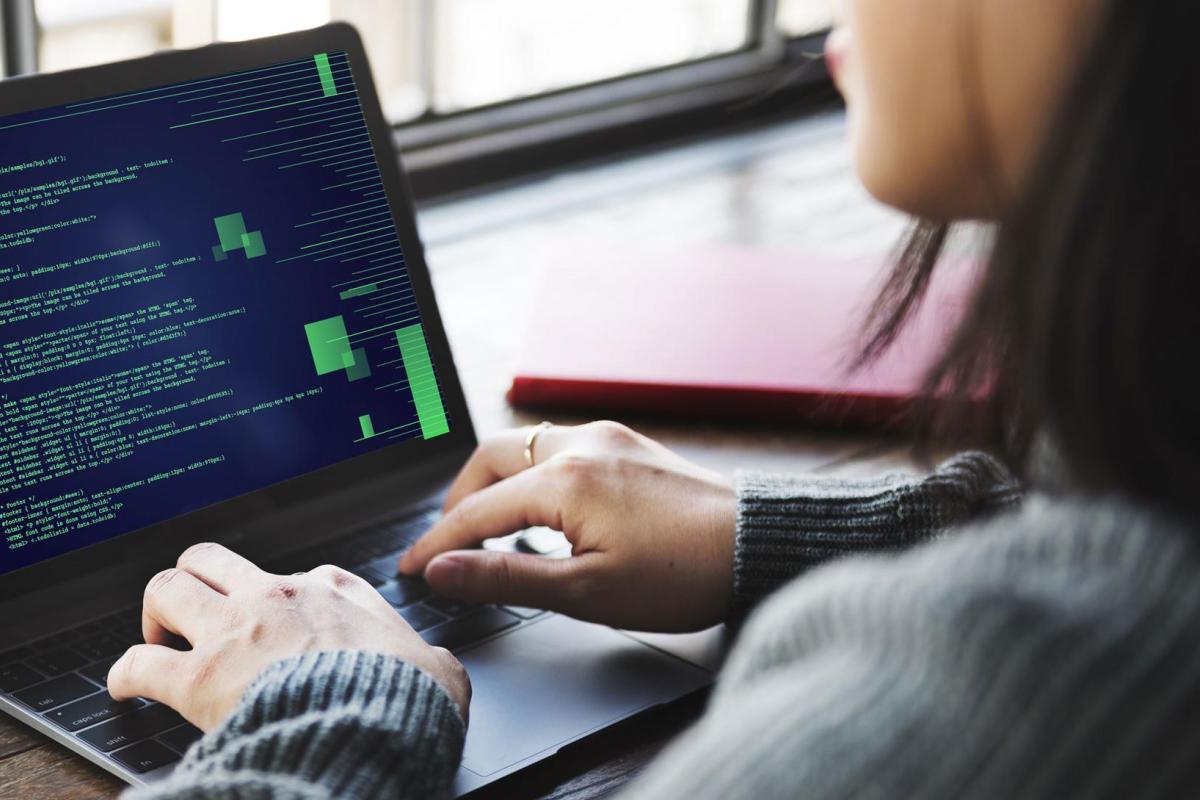 Student looking at laptop screen