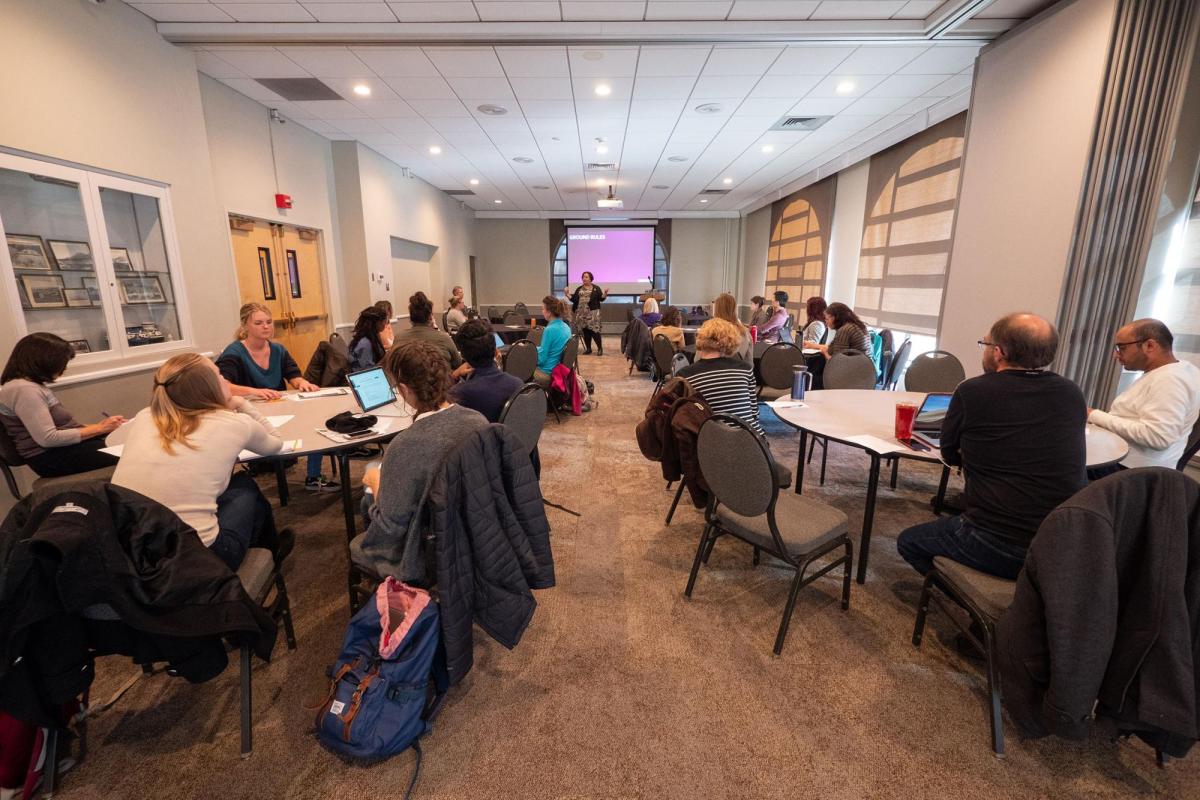 Attendees sitting at tables at Diversity Summit