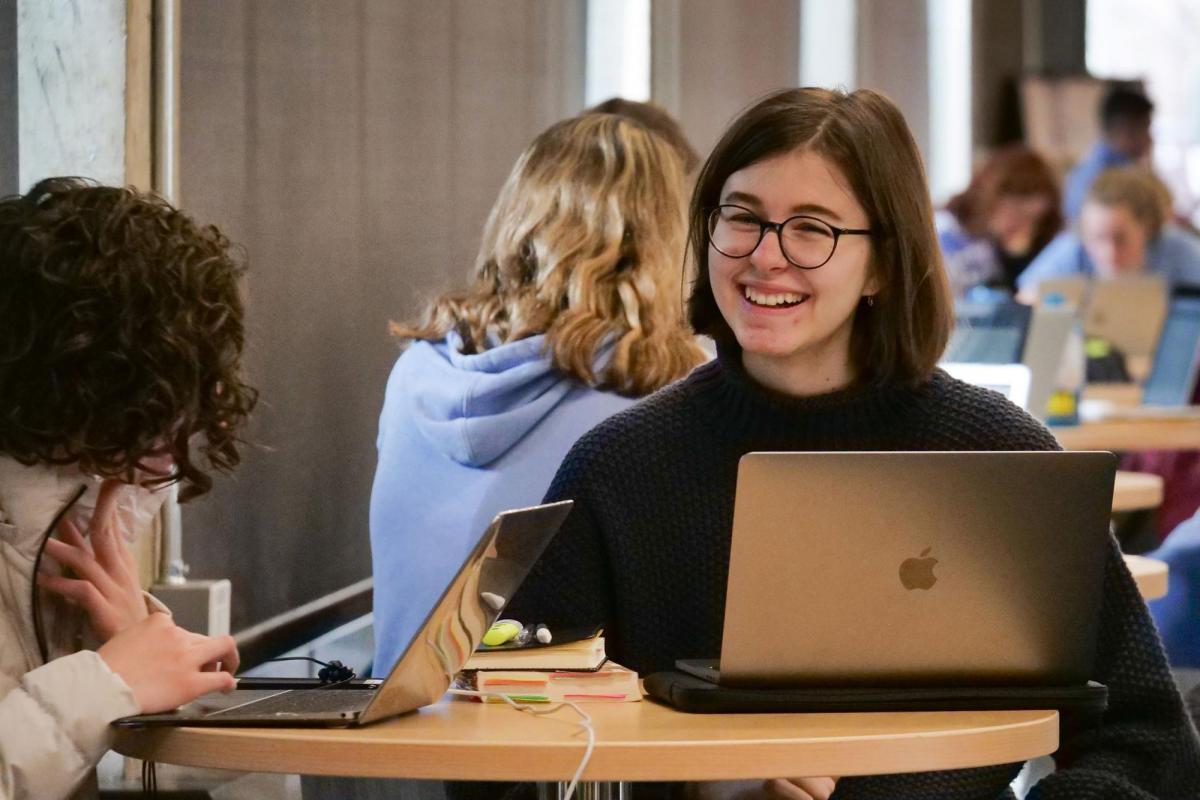 Students at table with their laptops