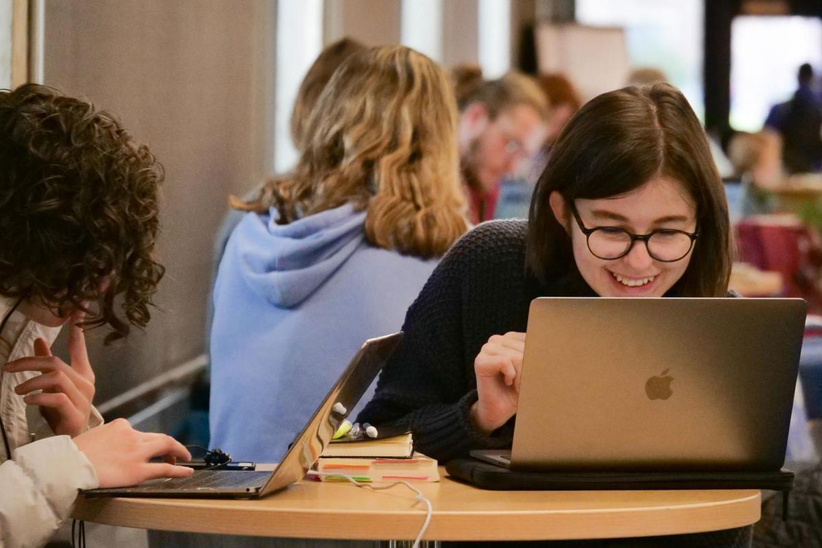 Students studying on laptops