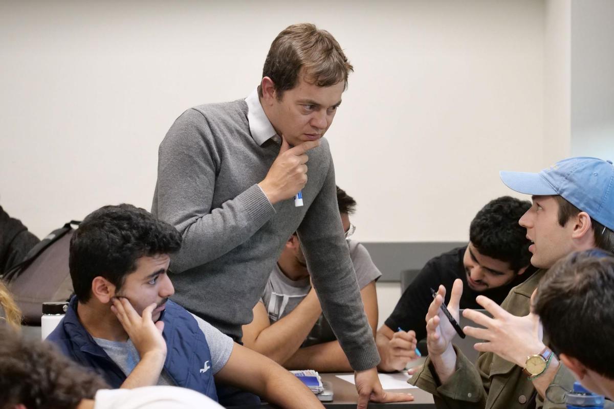 Faculty with students