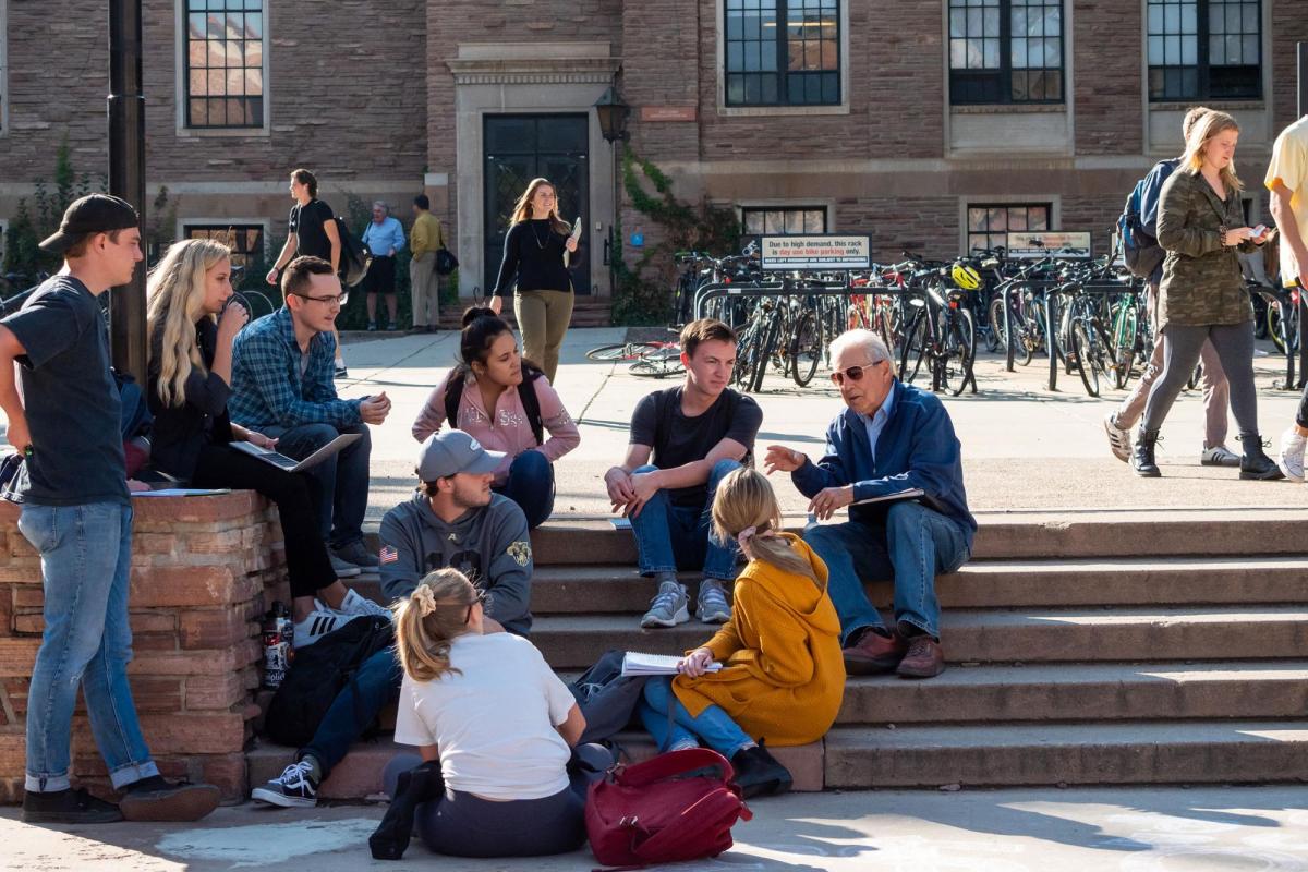 Class being held outdoors on campus