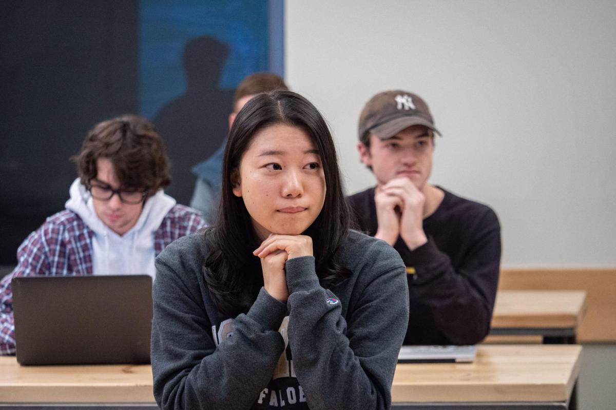 Students listening to professor in CMCI class