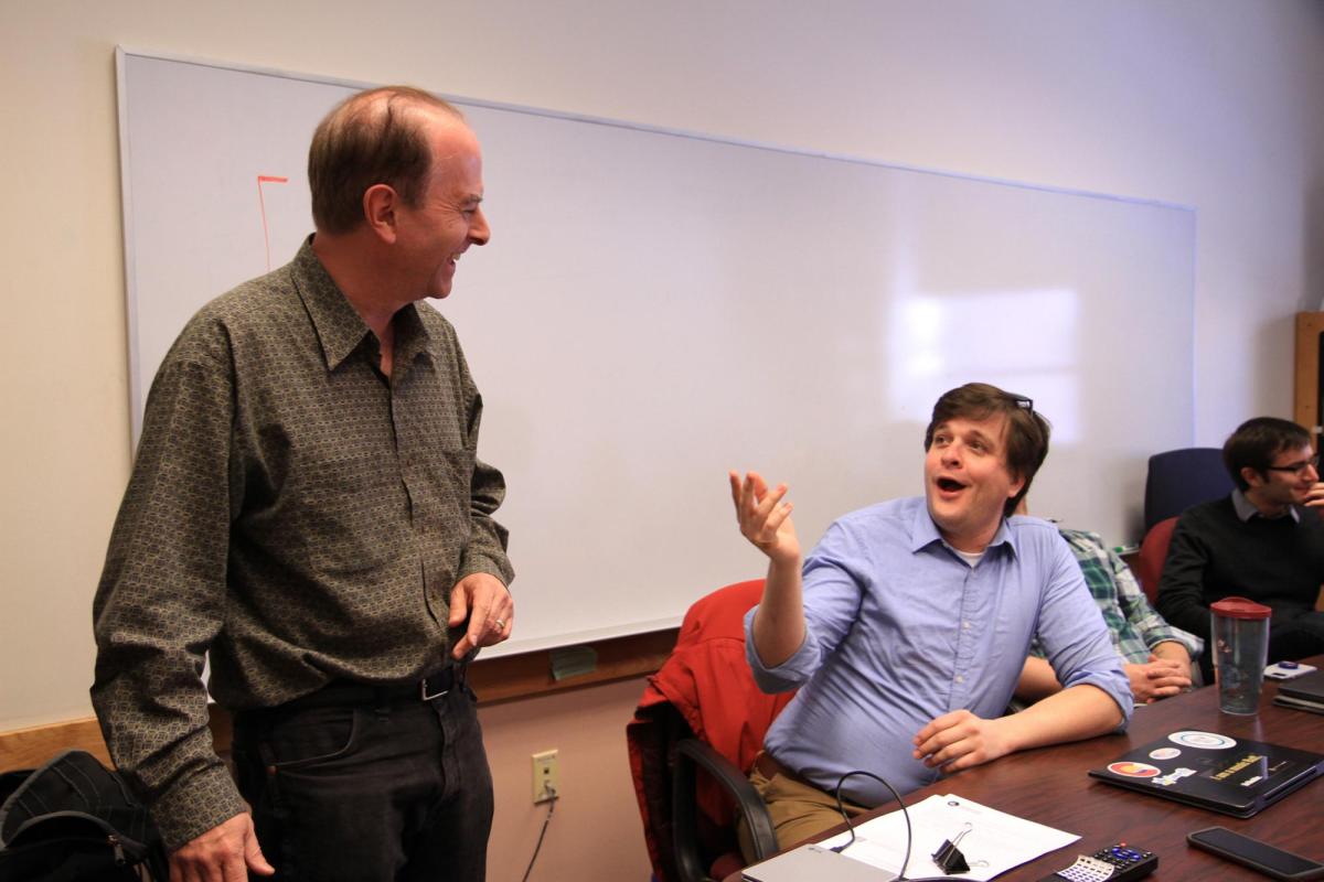 Faculty and alumni talking
