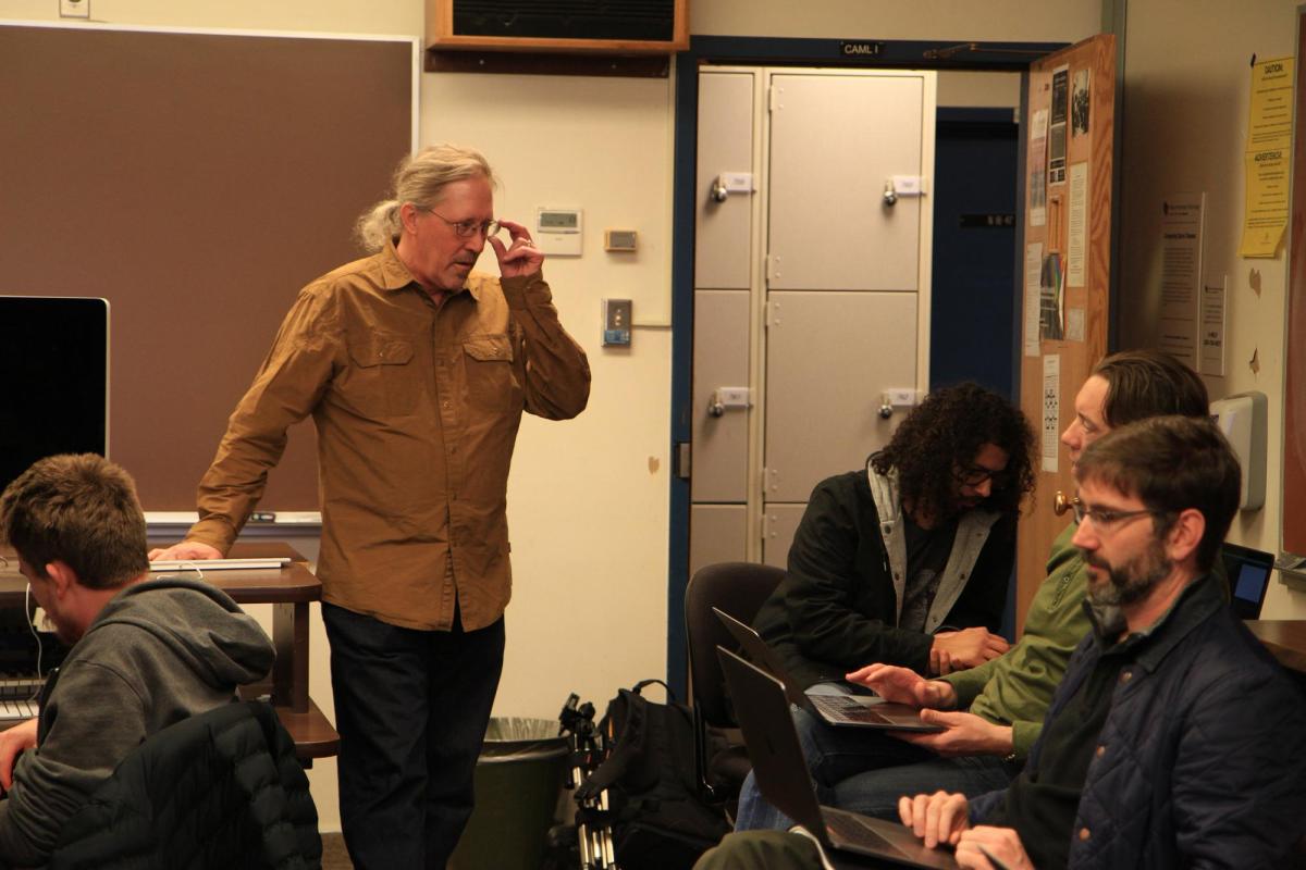 Faculty teaching students in Music Technology class