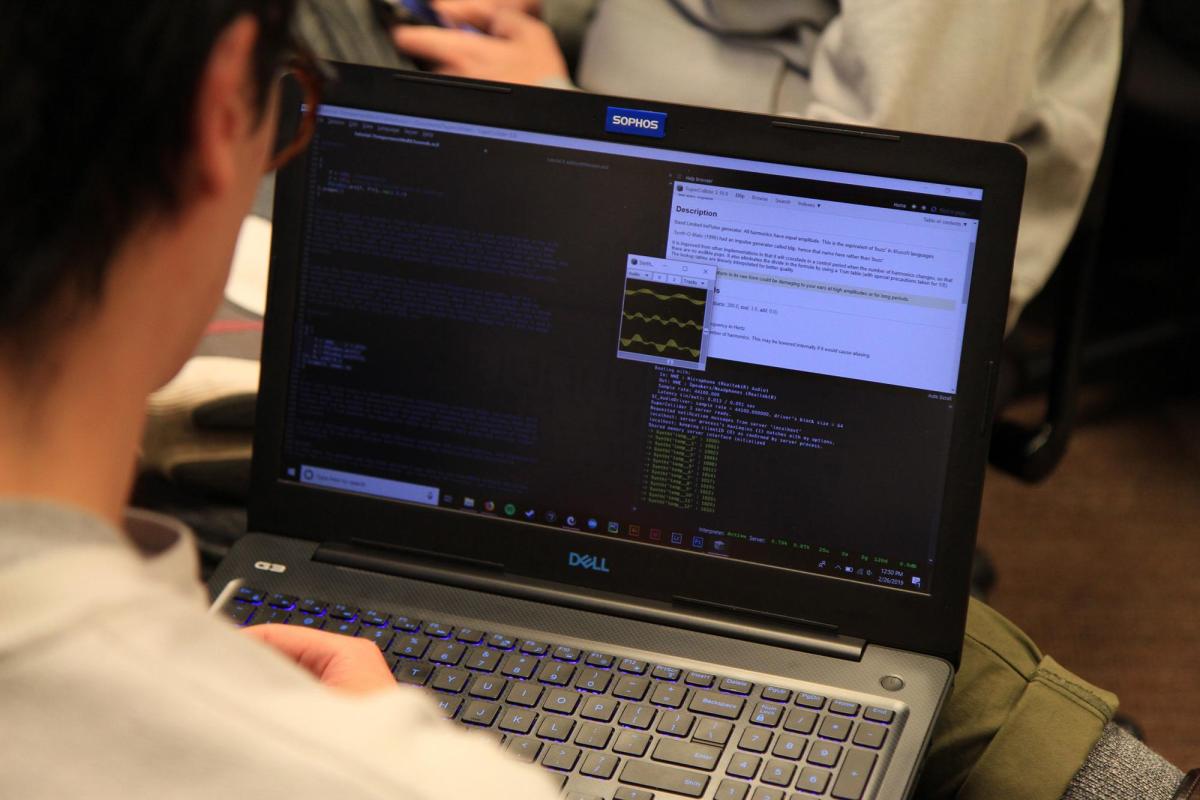 Student looking at laptop screen