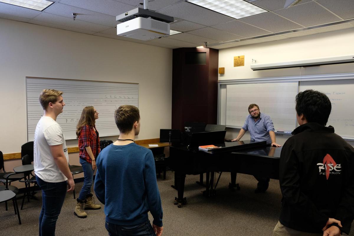 Faculty and students in music class