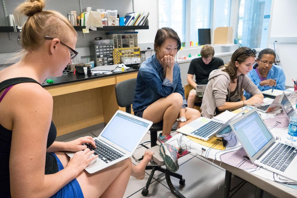 Students on laptops in Engineering class